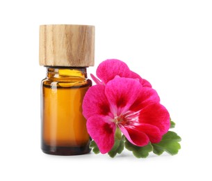 Photo of Geranium essential oil in bottle and beautiful flowers isolated on white