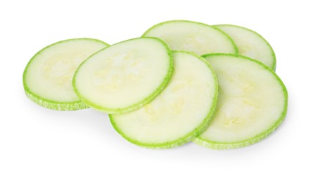 Photo of Pieces of fresh zucchini isolated on white