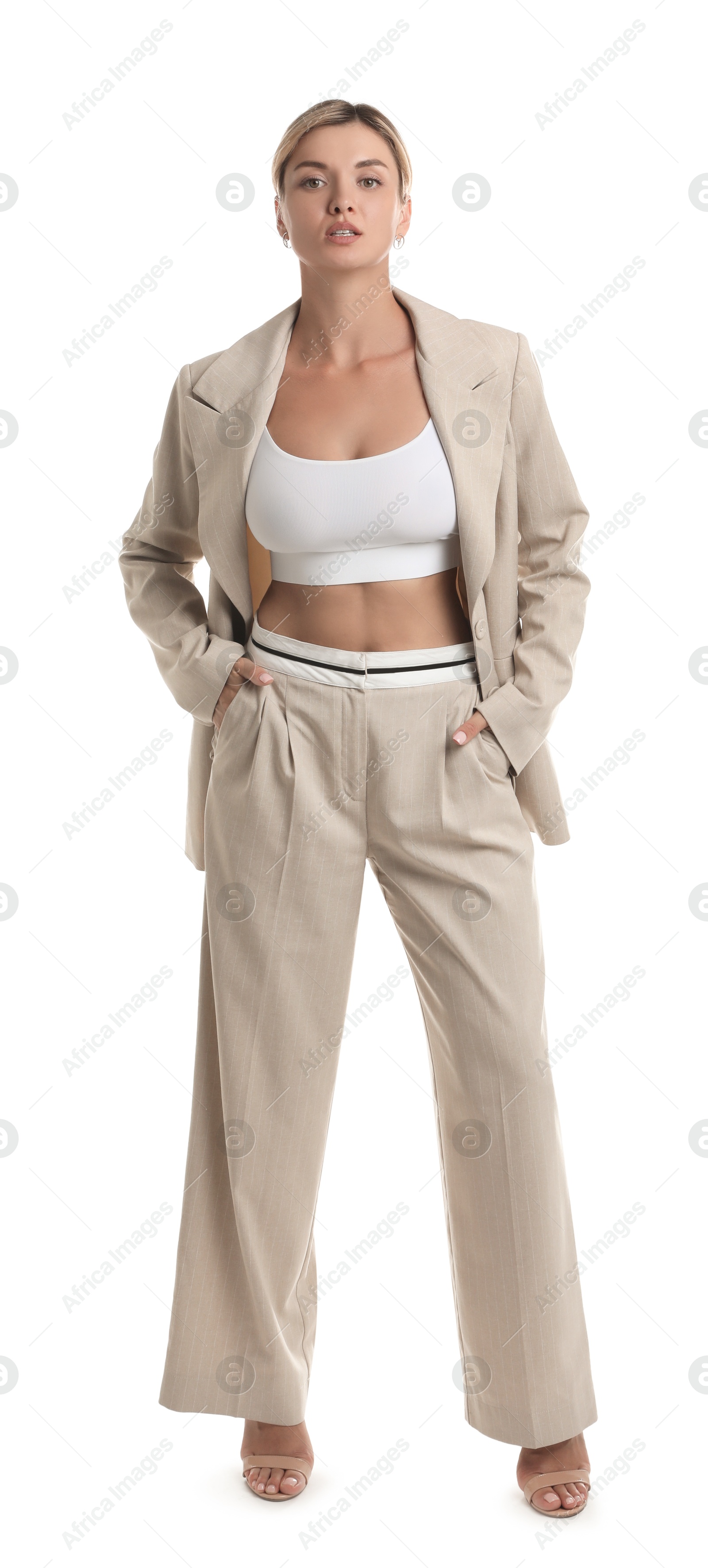 Photo of Beautiful woman in stylish suit on white background