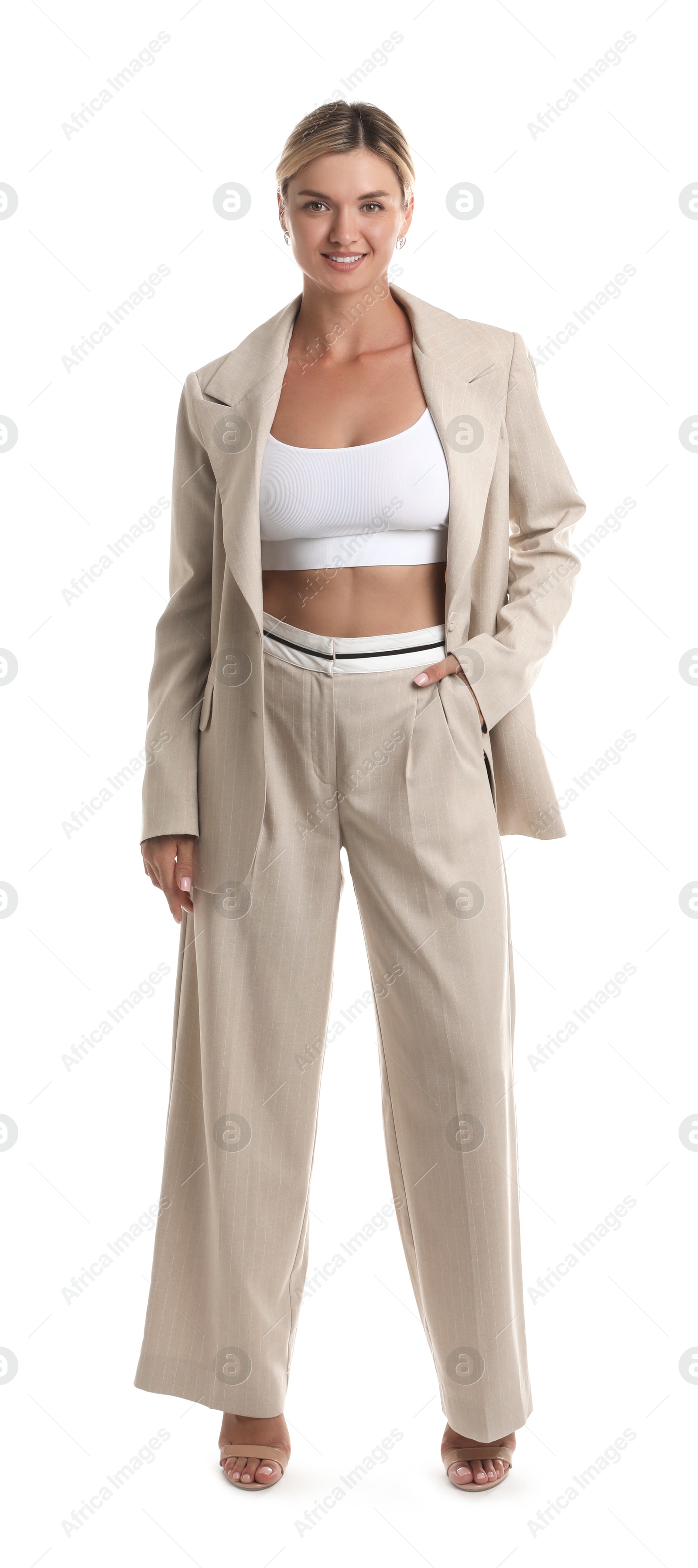 Photo of Beautiful woman in stylish suit on white background