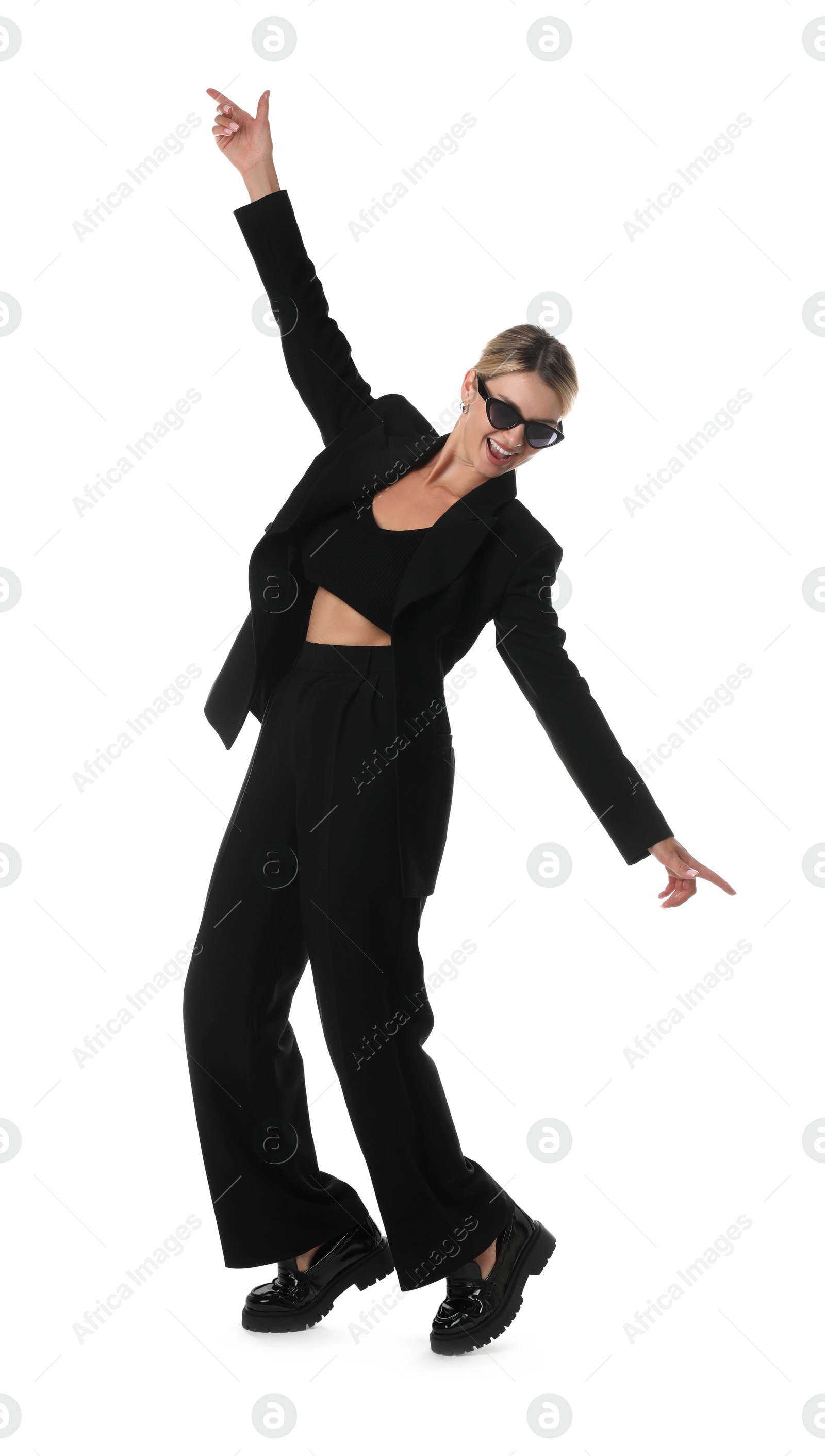 Photo of Beautiful woman in stylish black suit posing on white background