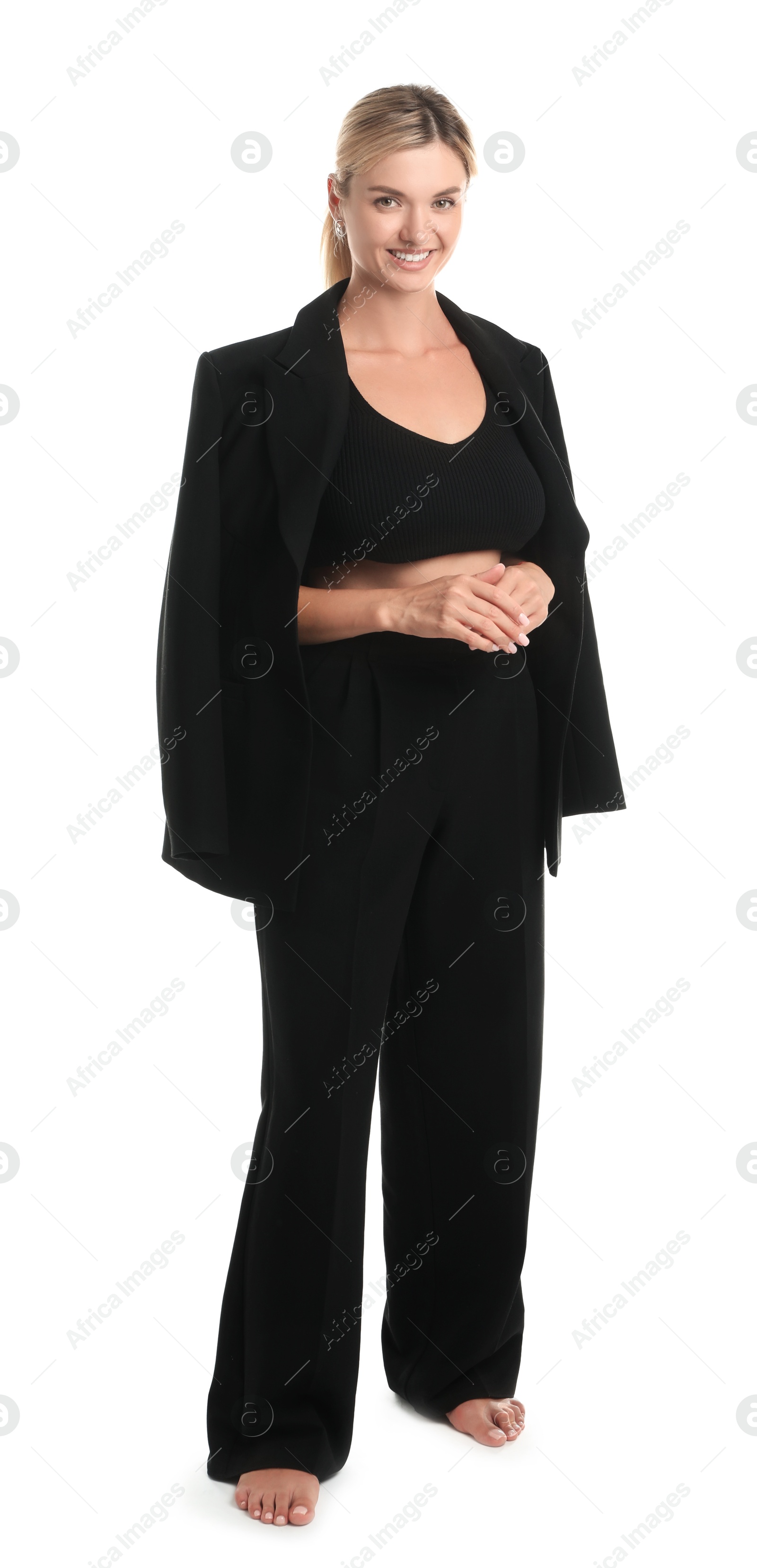 Photo of Beautiful woman in stylish suit on white background