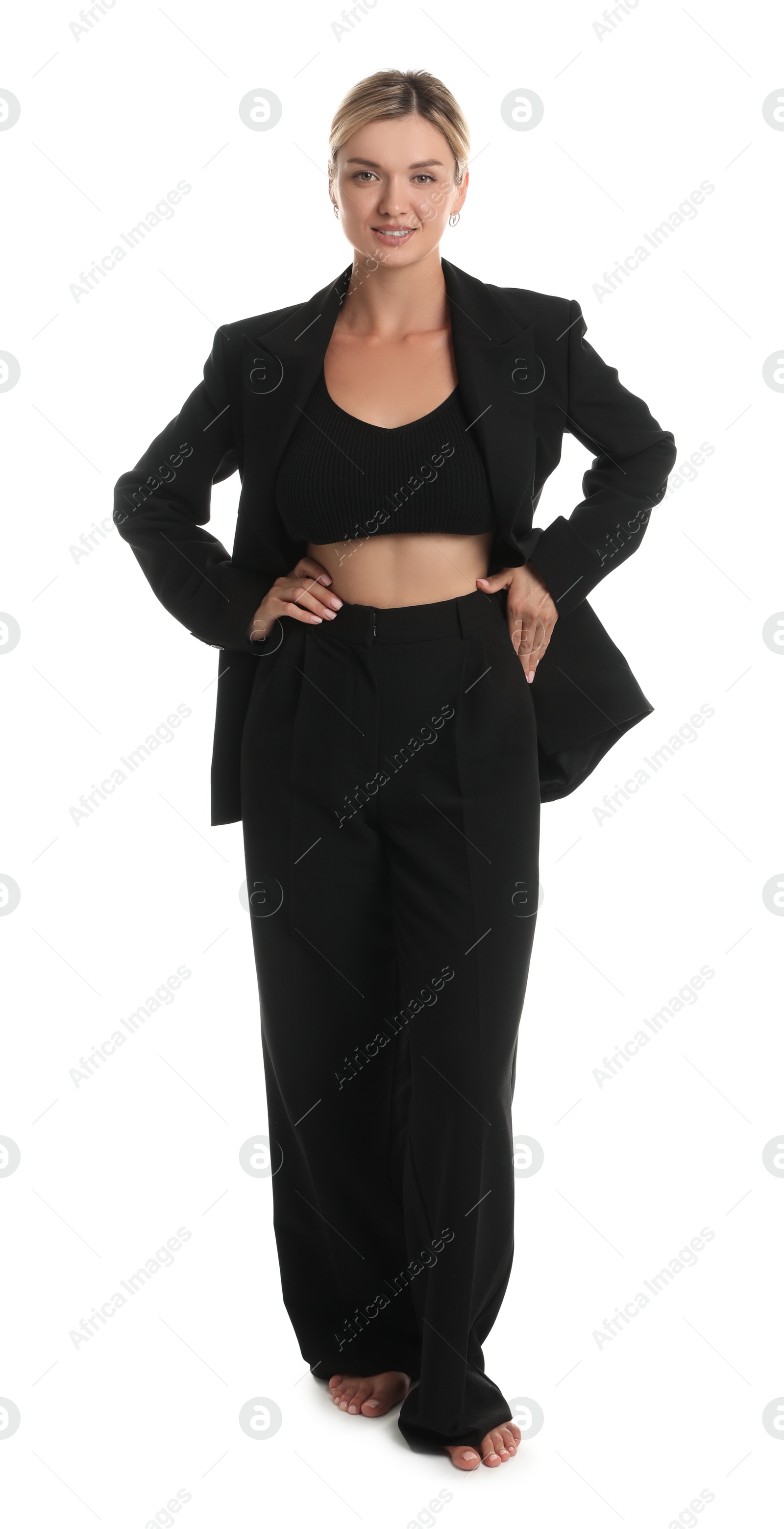 Photo of Beautiful woman in stylish suit on white background