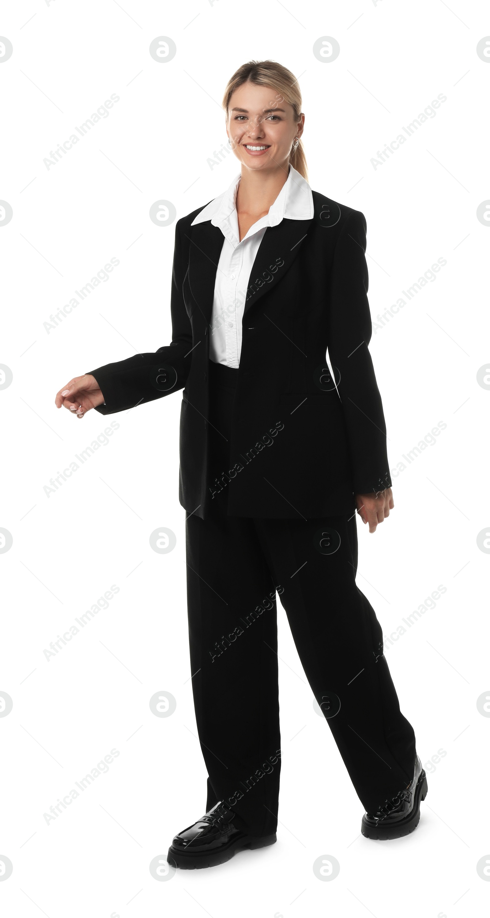 Photo of Beautiful woman in stylish black suit posing on white background