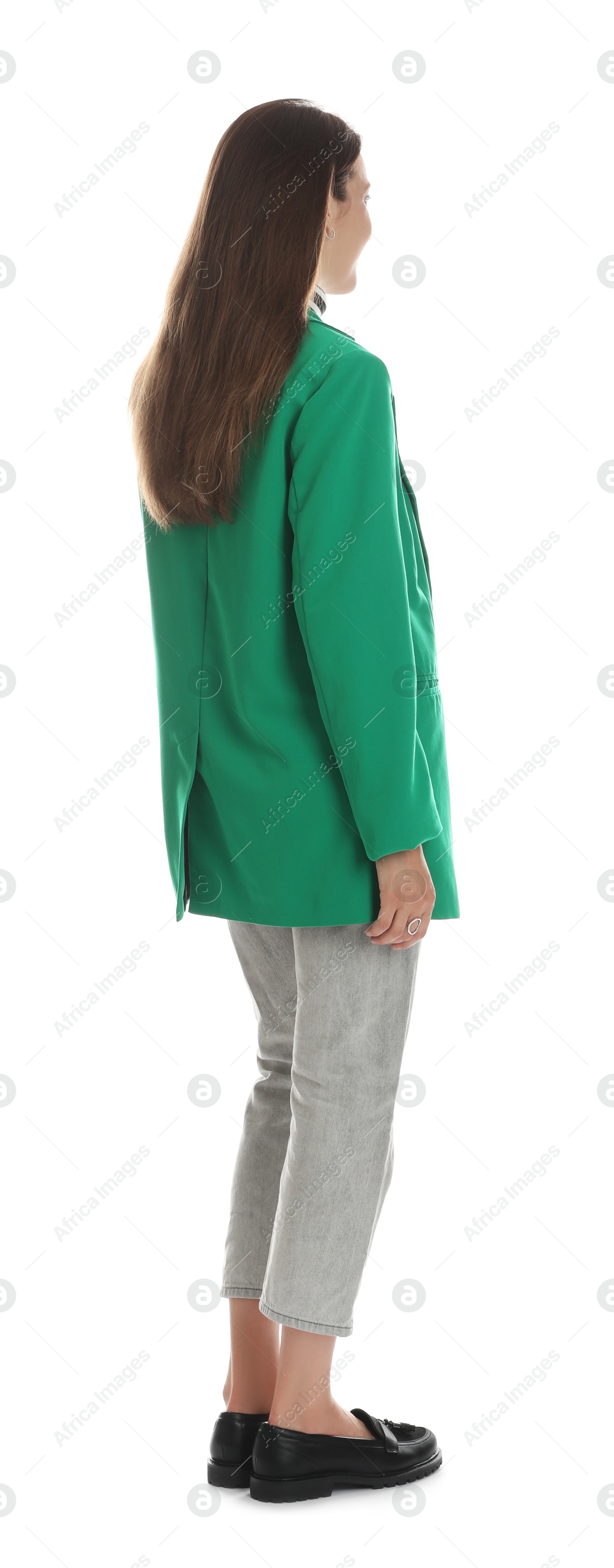 Photo of Young woman in stylish green jacket on white background, back view