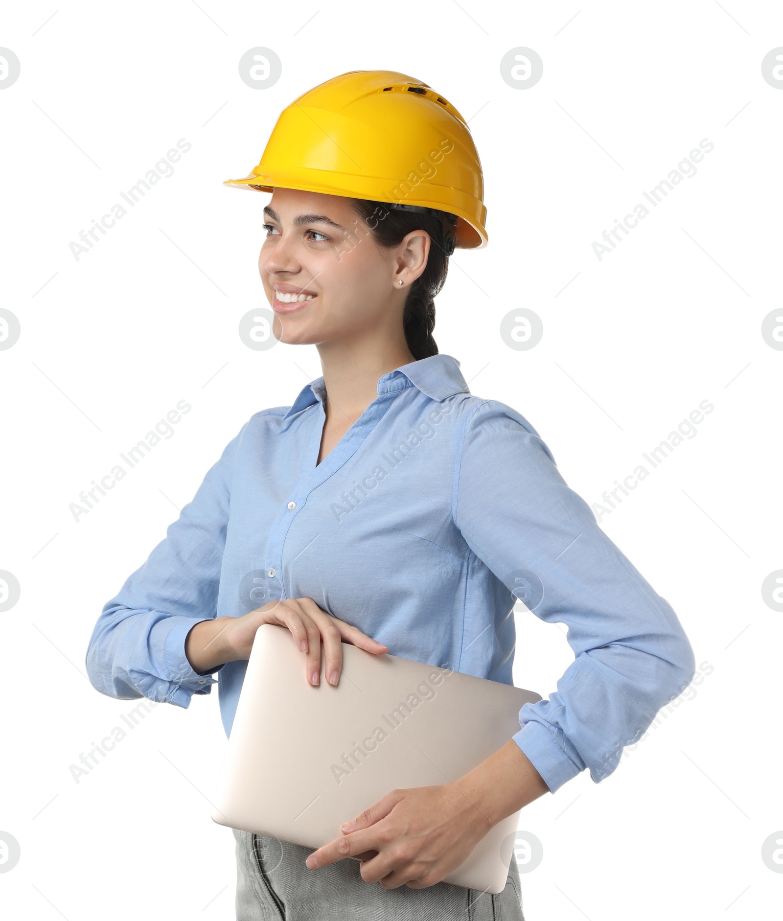 Photo of Engineer in hard hat with laptop on white background