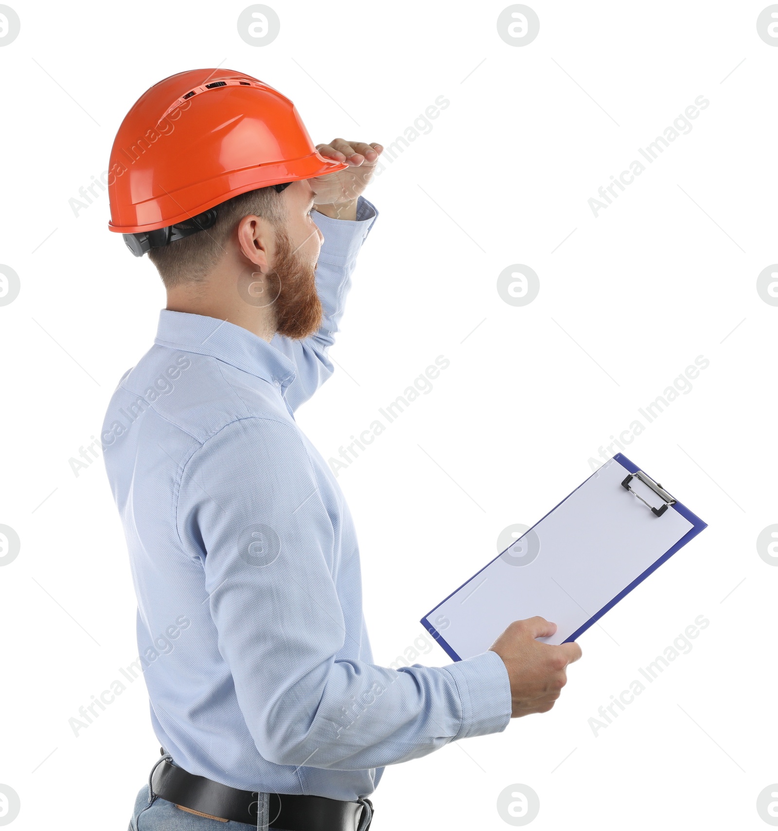 Photo of Engineer in hard hat with clipboard on white background