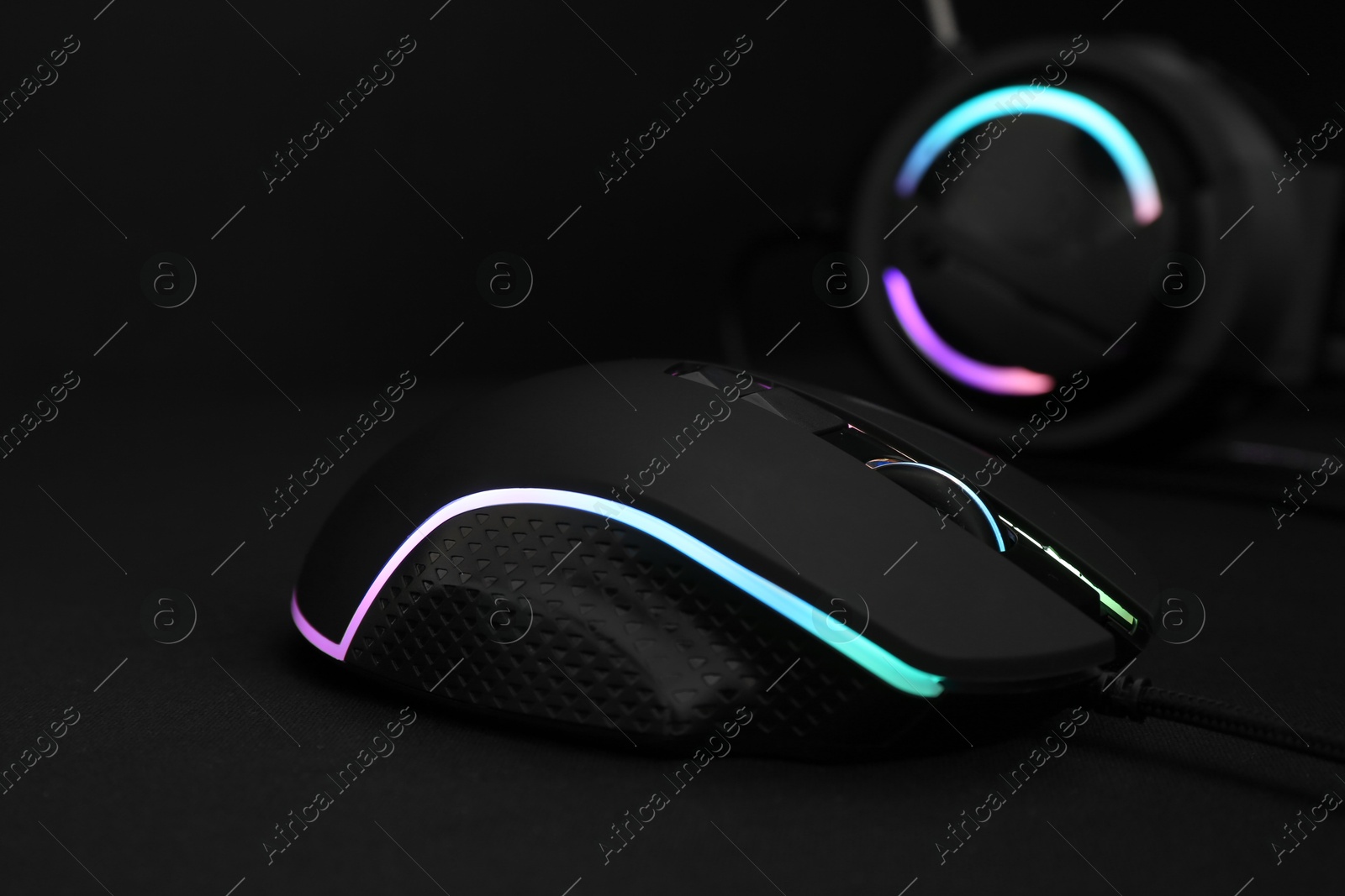 Photo of Computer mouse on black background, closeup view