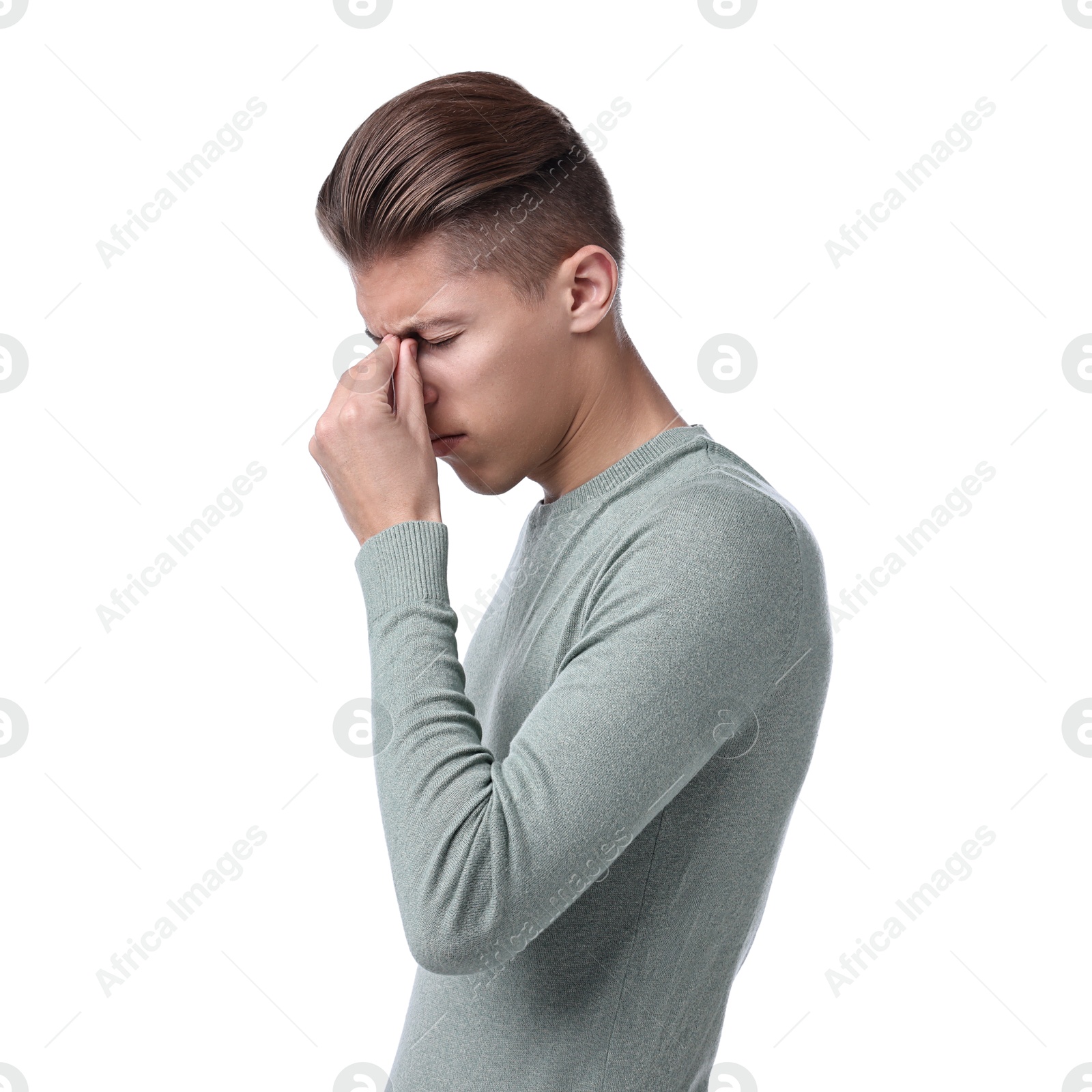 Photo of Young man suffering from sinusitis on white background