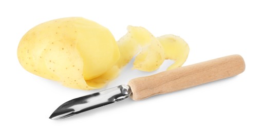 Photo of Young potato, peel and peeler isolated on white