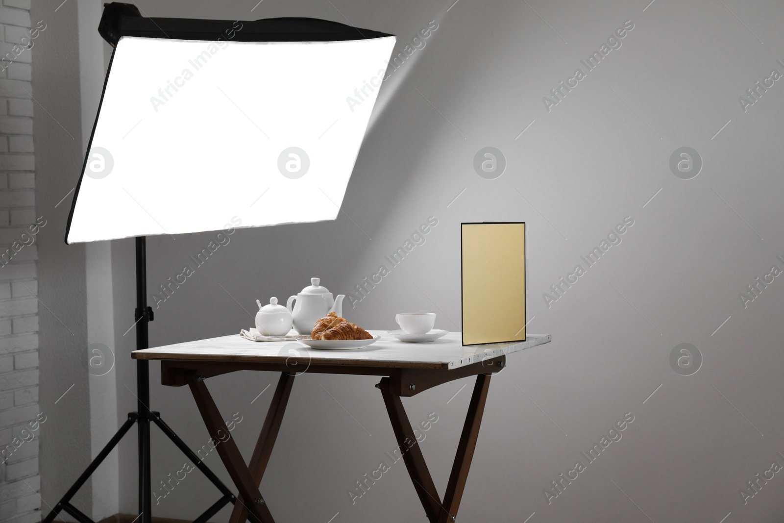 Photo of Shooting food in photo studio with professional lighting equipment