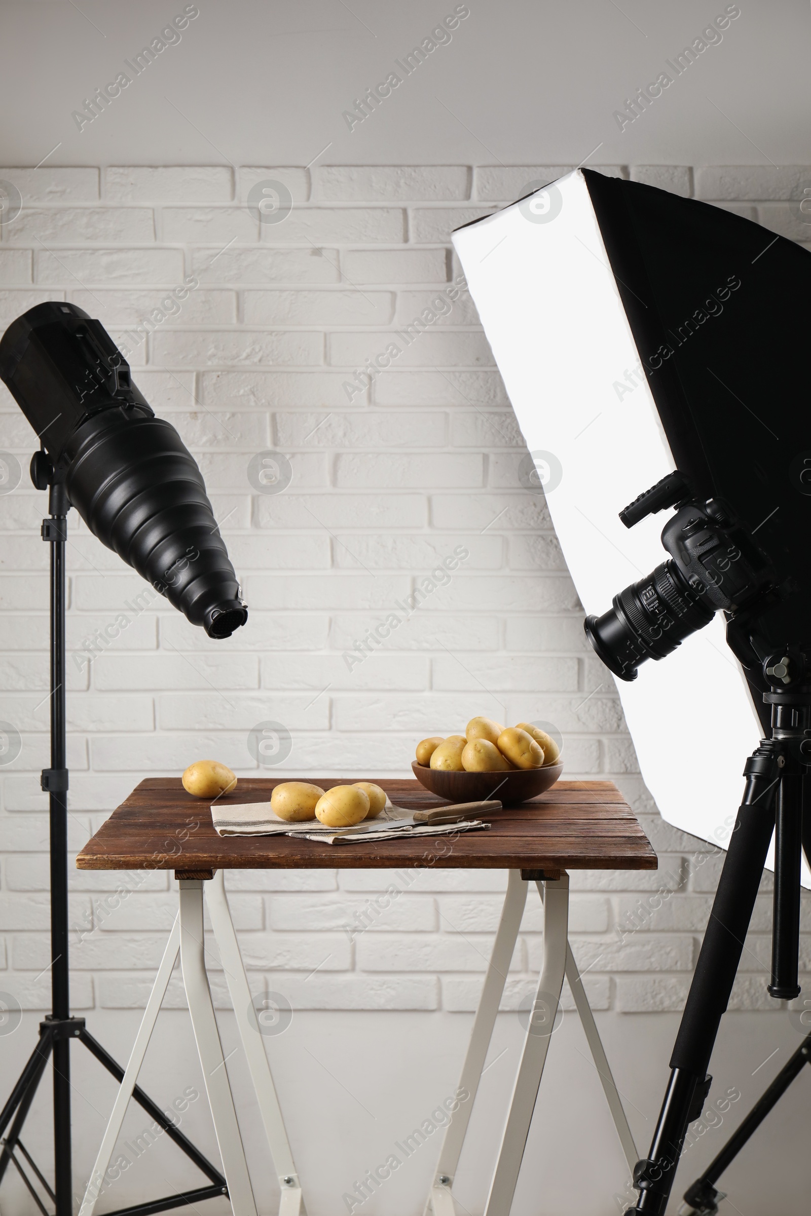 Photo of Shooting food in photo studio with professional lighting equipment