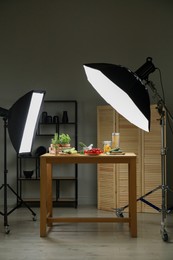 Photo of Shooting food in photo studio with professional lighting equipment