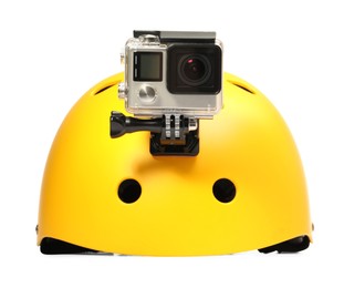 Photo of Modern action camera on helmet against white background