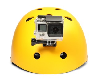 Photo of Modern action camera on helmet against white background