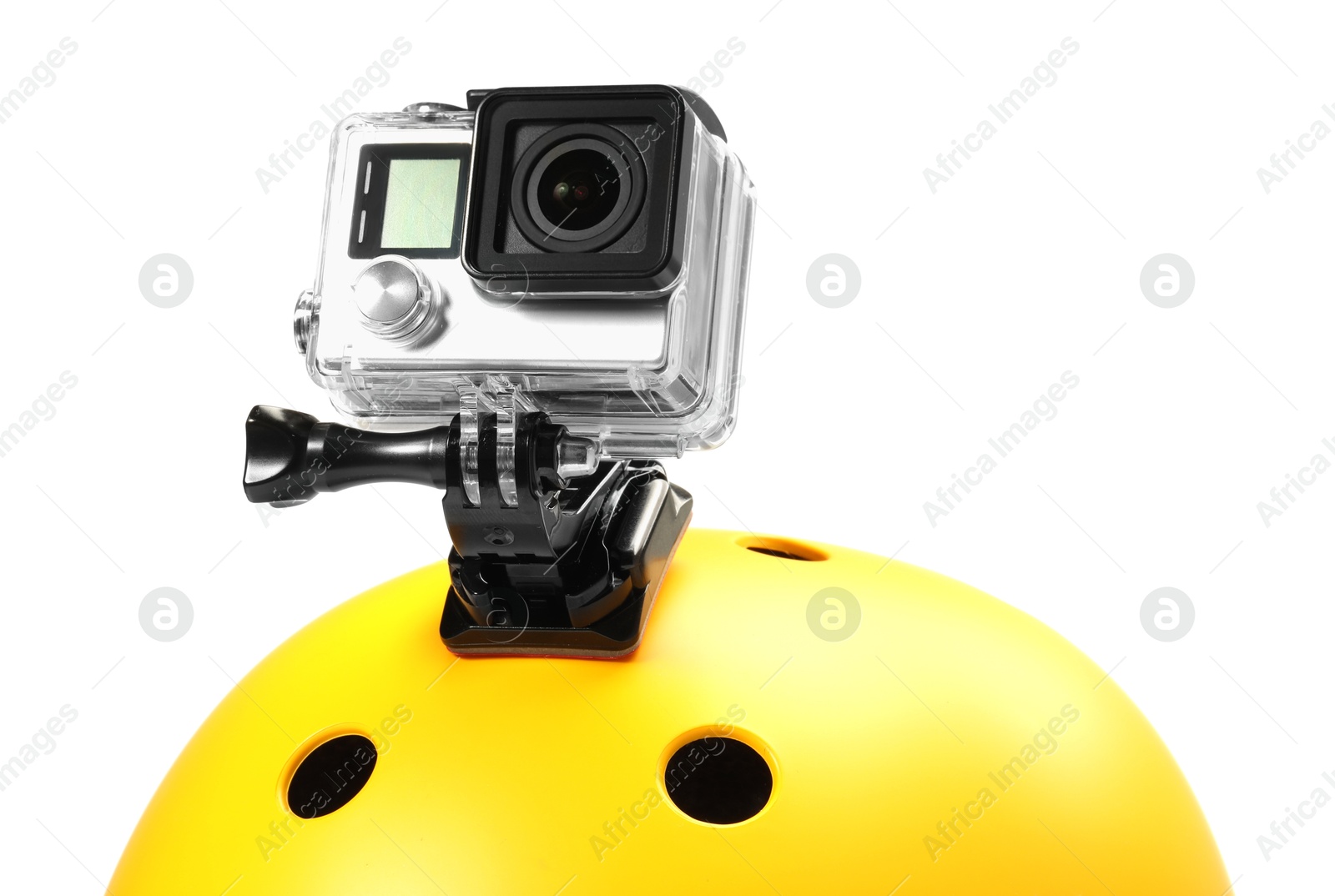 Photo of Modern action camera on helmet against white background