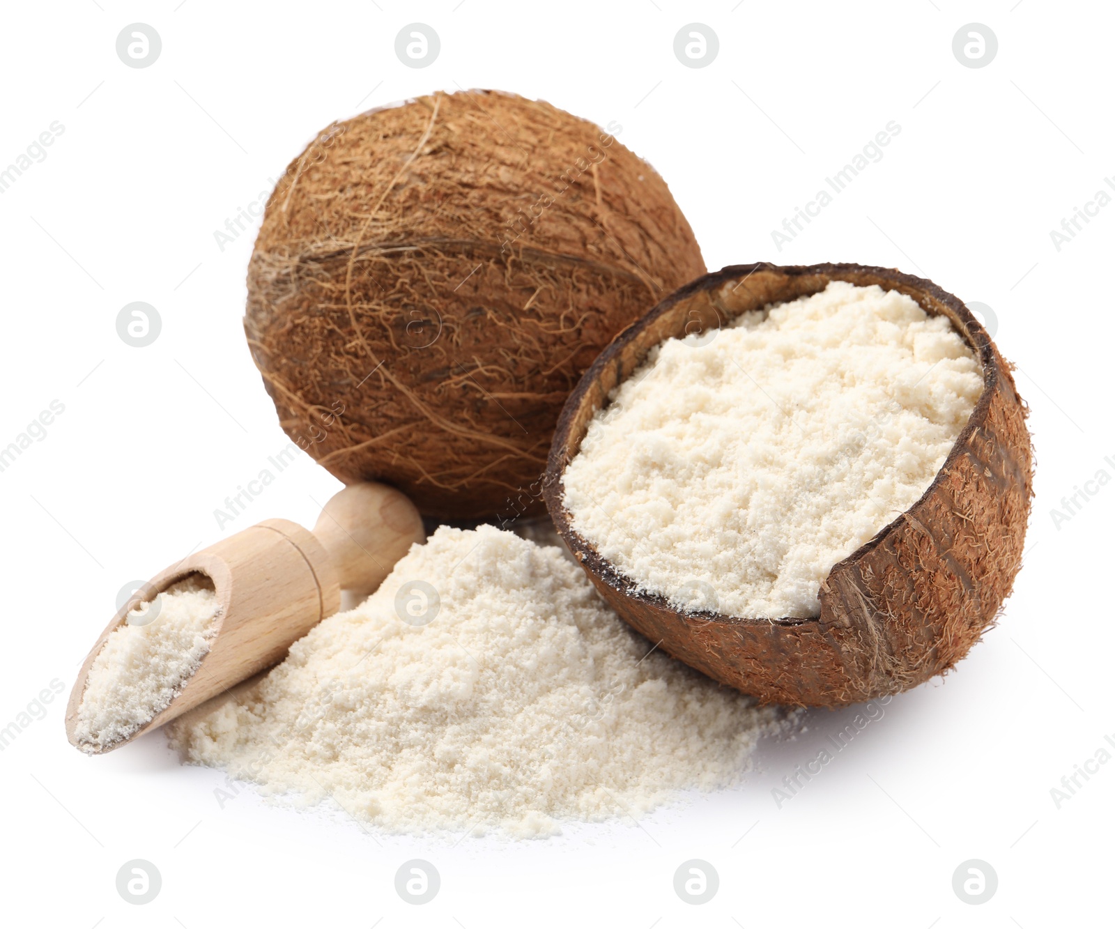 Photo of Fresh coconut flour, scoop and nuts isolated on white