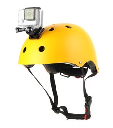 Modern action camera on helmet against white background