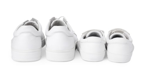 Big and small sneakers isolated on white