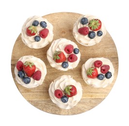 Photo of Tasty cupcakes with different berries isolated on white, top view