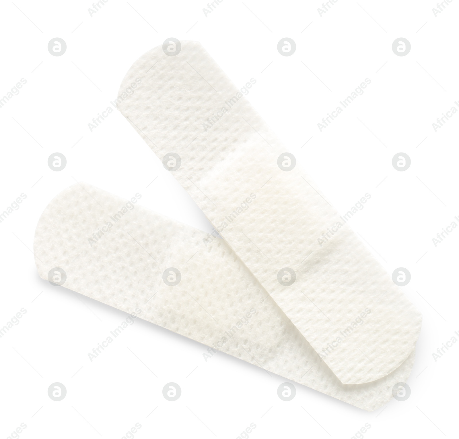 Medical adhesive bandages isolated on white, top view Photo of Medical adhesive bandages isolated on white, top view