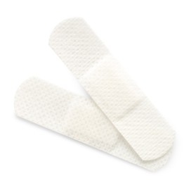Photo of Medical adhesive bandages isolated on white, top view