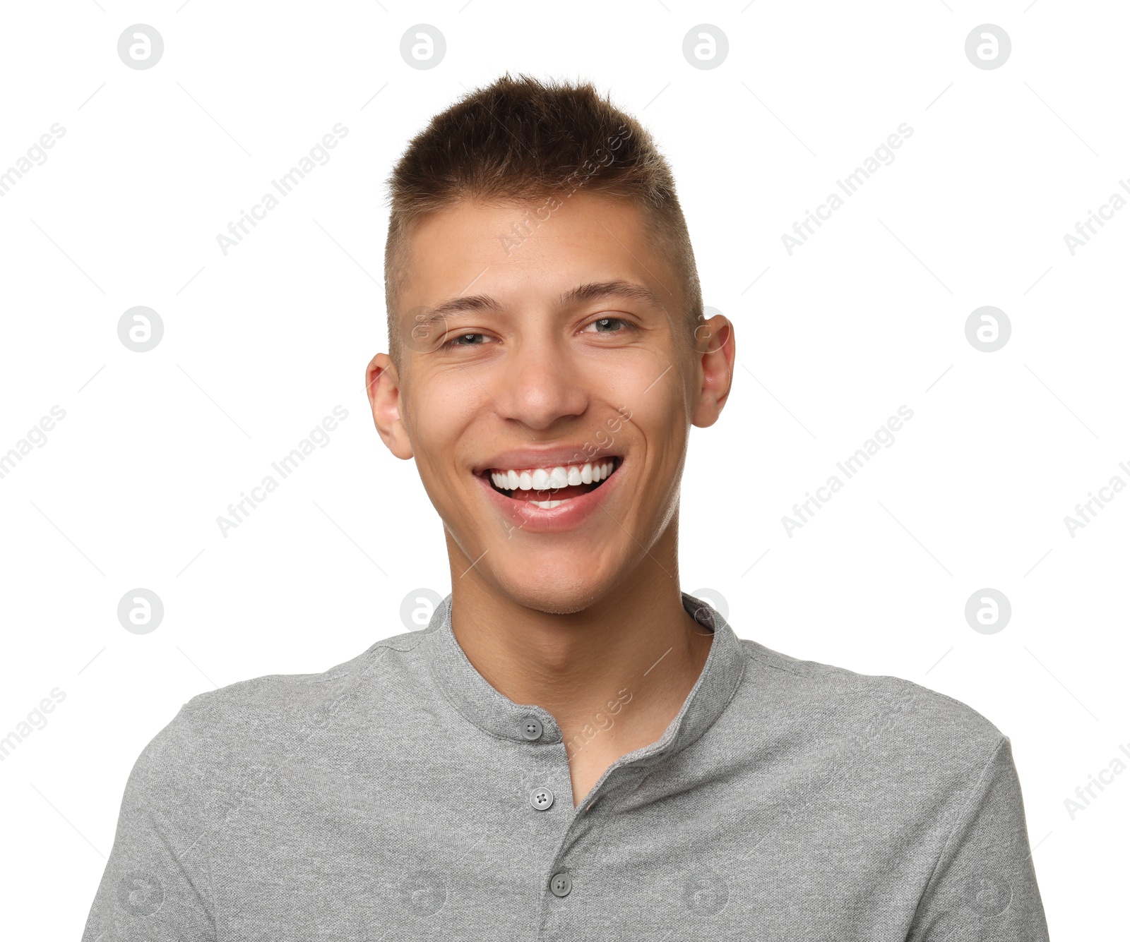 Photo of Happy young man on white background. Dental veneers