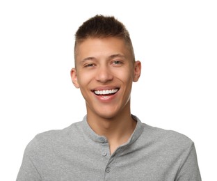 Happy young man on white background. Dental veneers