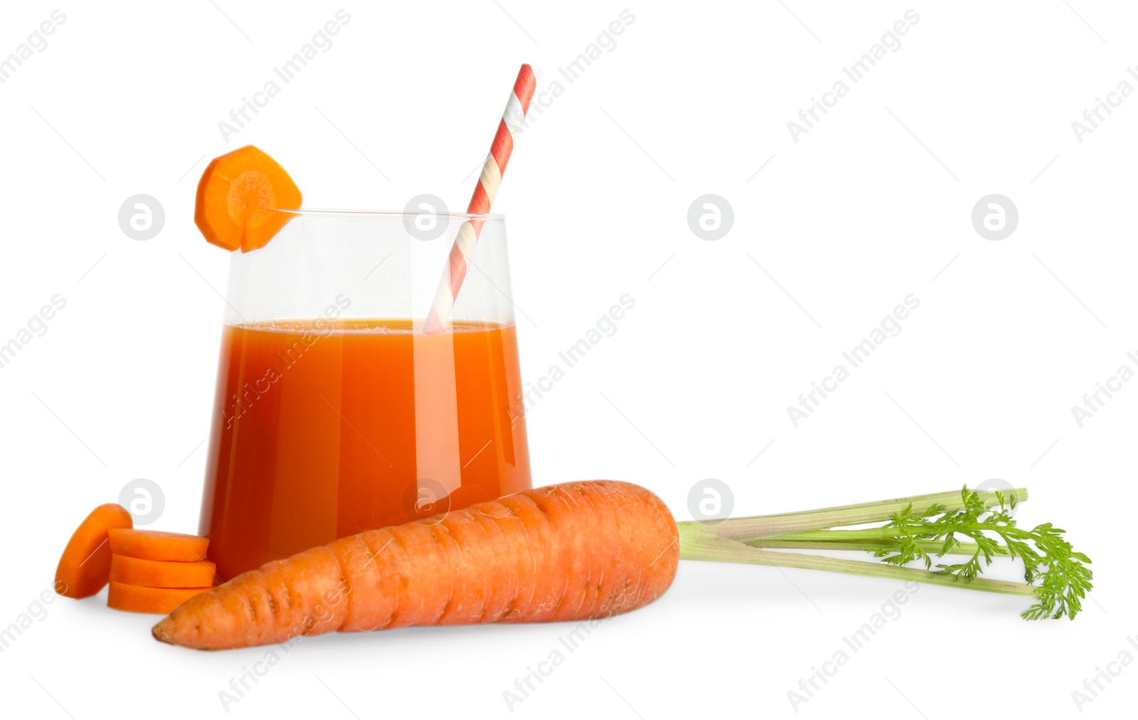 Photo of Healthy carrot juice in glass and fresh vegetables isolated on white