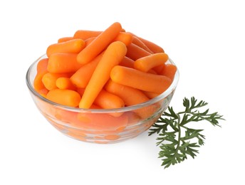 Photo of Baby carrots in bowl and green leaf isolated on white