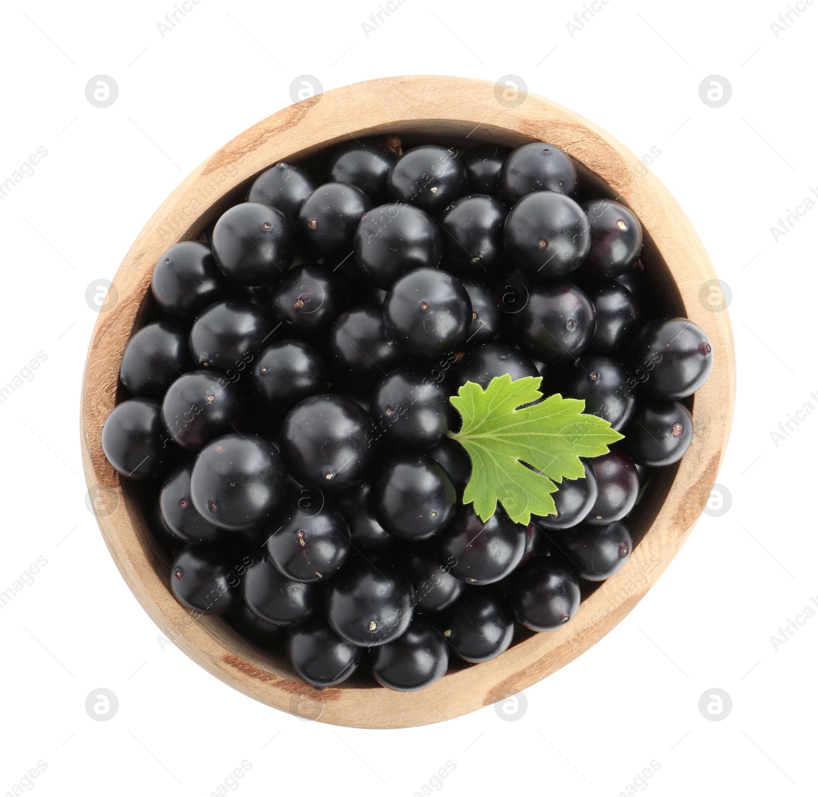 Photo of Fresh ripe black currant berries with leaf isolated on white, top view