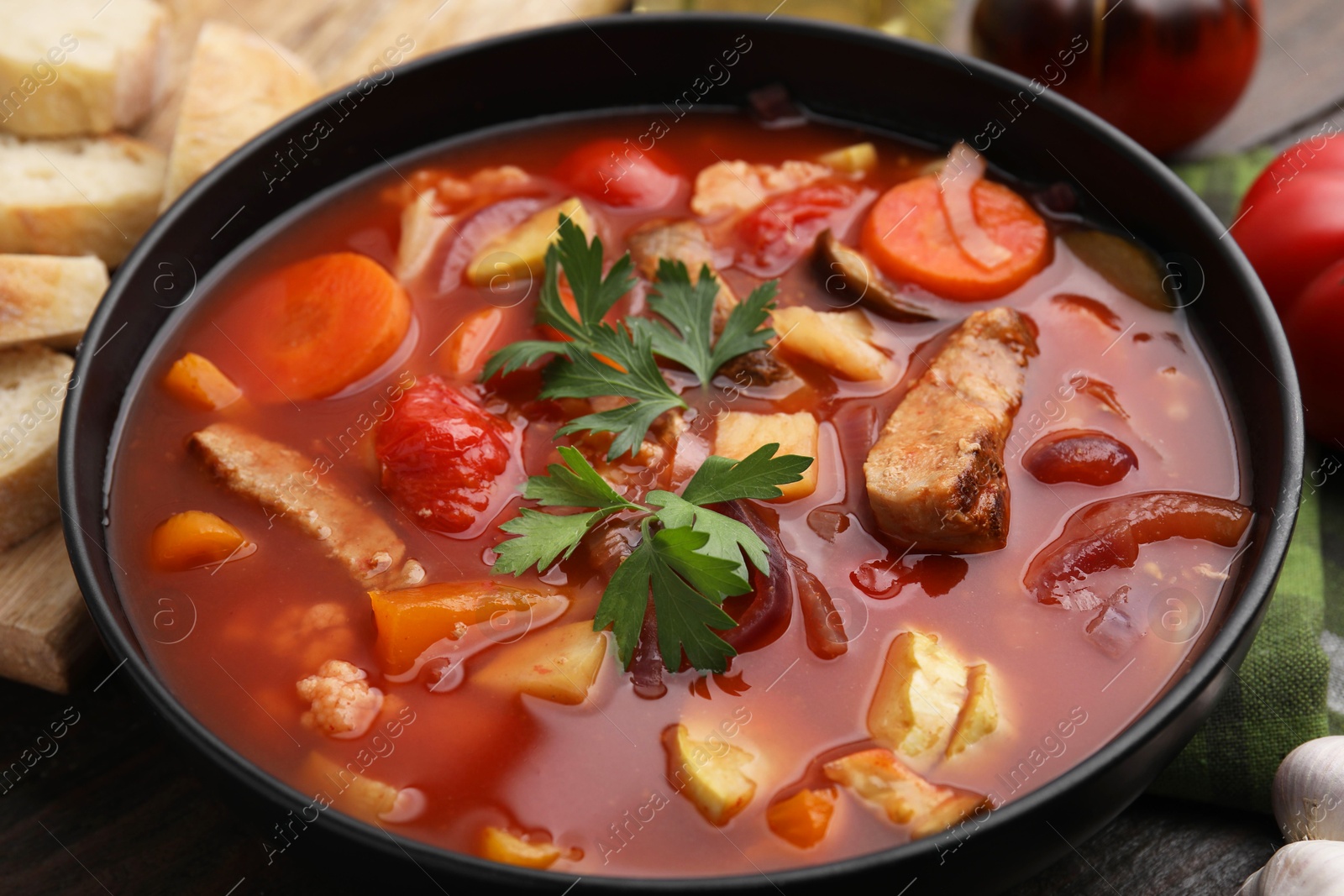 Photo of Tasty homemade stew with vegetables on table, closeup