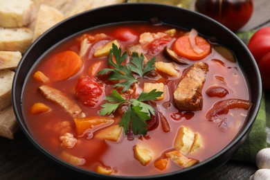 Tasty homemade stew with vegetables on table, closeup