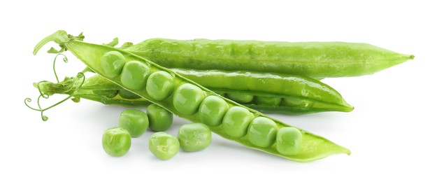 Green fresh peas and pods isolated on white