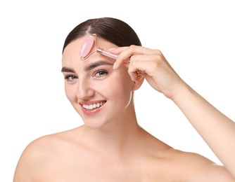 Photo of Beautiful young woman doing facial massage with roller on white background