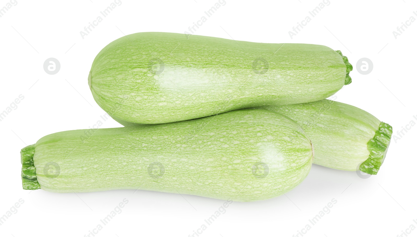 Photo of Many fresh ripe zucchinis isolated on white, above view