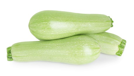 Photo of Many fresh ripe zucchinis isolated on white, above view