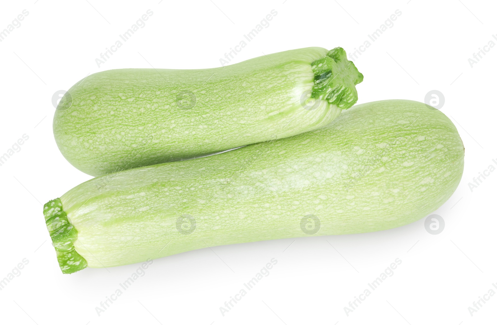 Photo of Two fresh ripe zucchinis isolated on white