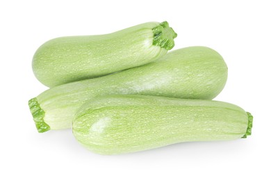 Photo of Many fresh ripe zucchinis isolated on white, above view