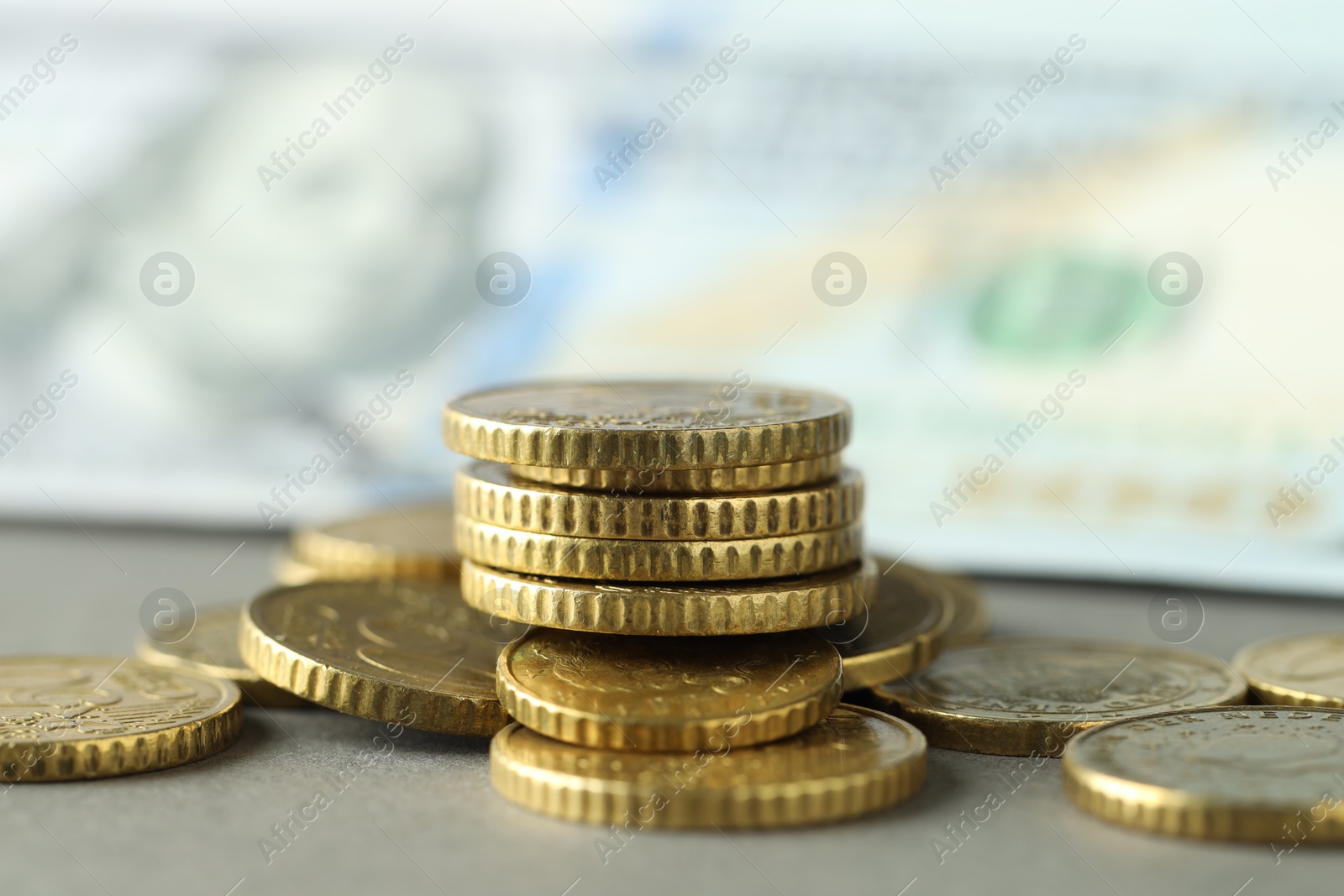 Photo of Many euro coins on grey background, closeup