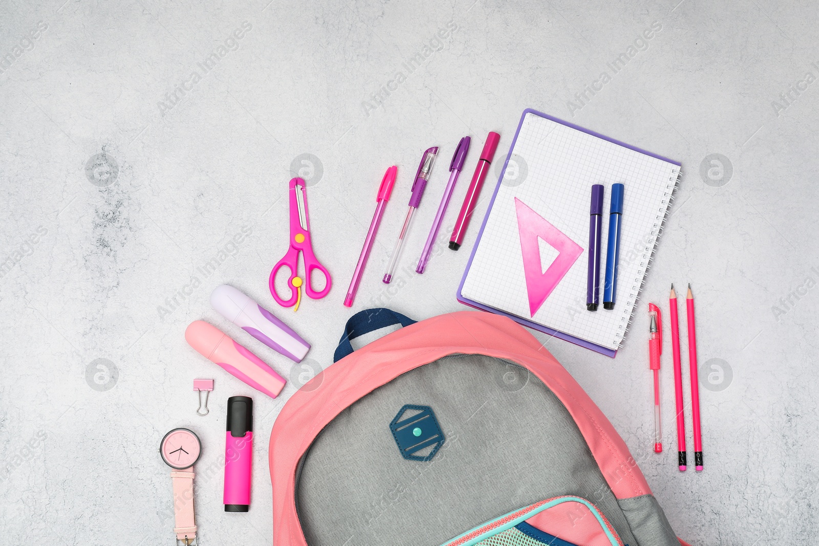 Photo of Flat lay composition with backpack and different school stationery on light grey table