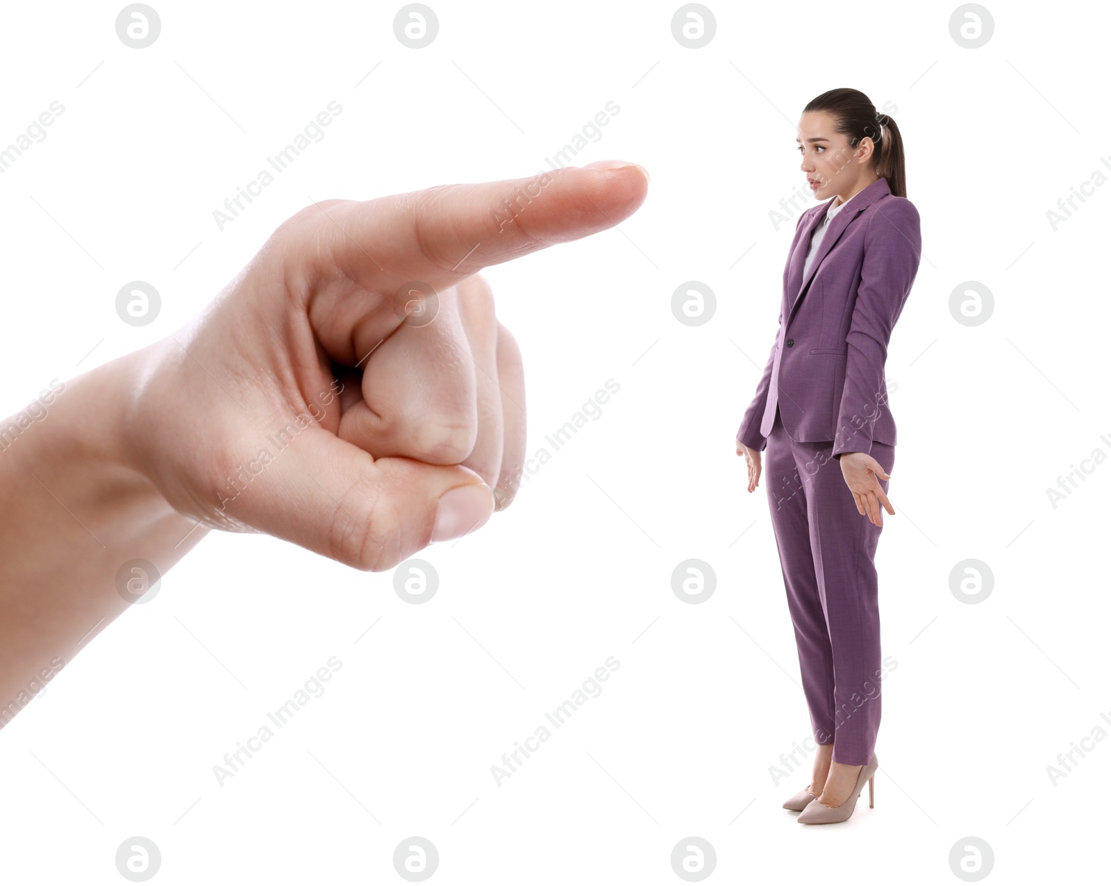 Image of Boss or colleague pointing at confused woman on white background. Failure at work, responsibility, social pressure