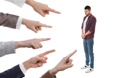 Women pointing at man on white background. Social pressure, responsibility, failure