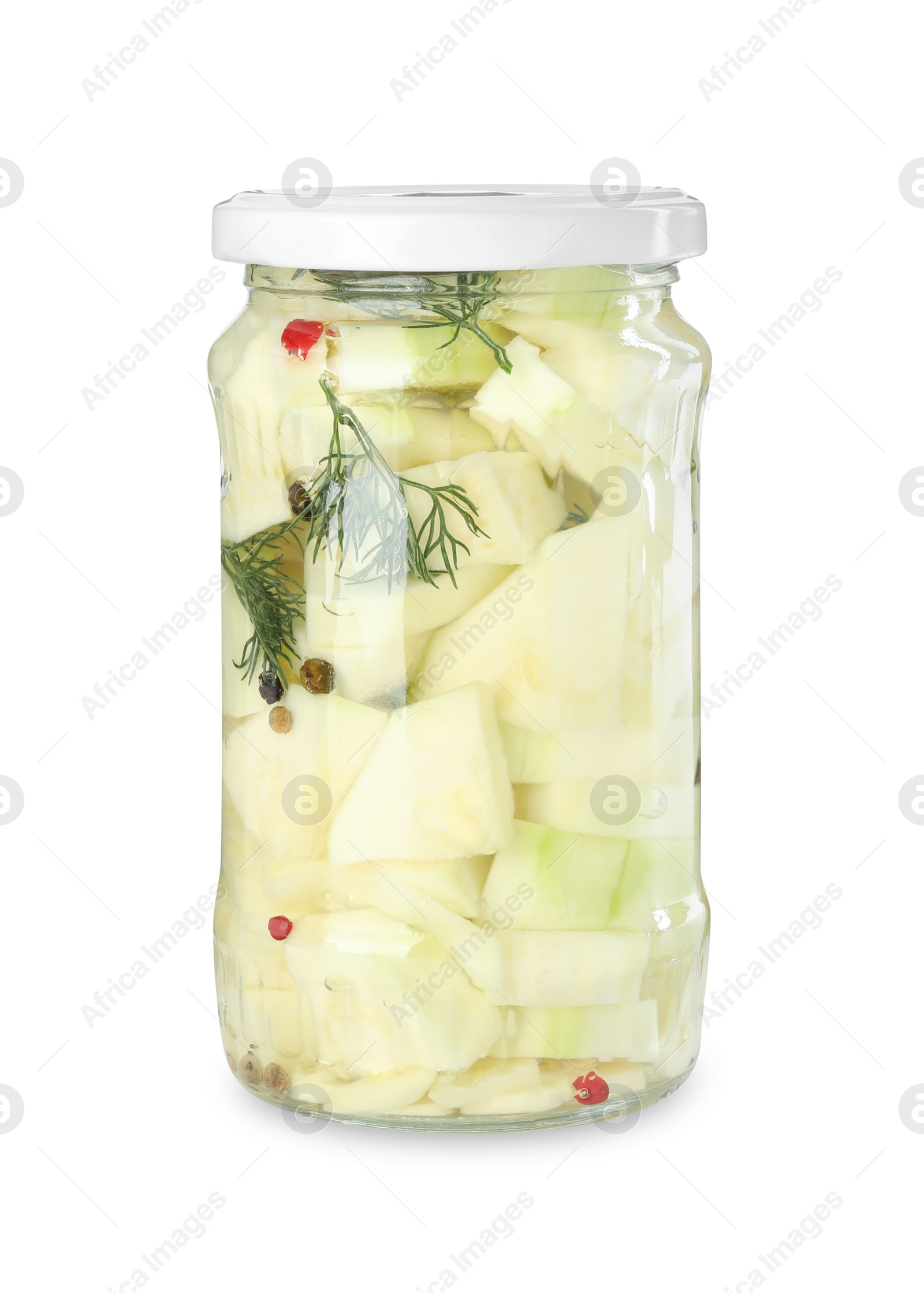 Photo of Tasty pickled zucchinis in jar isolated on white