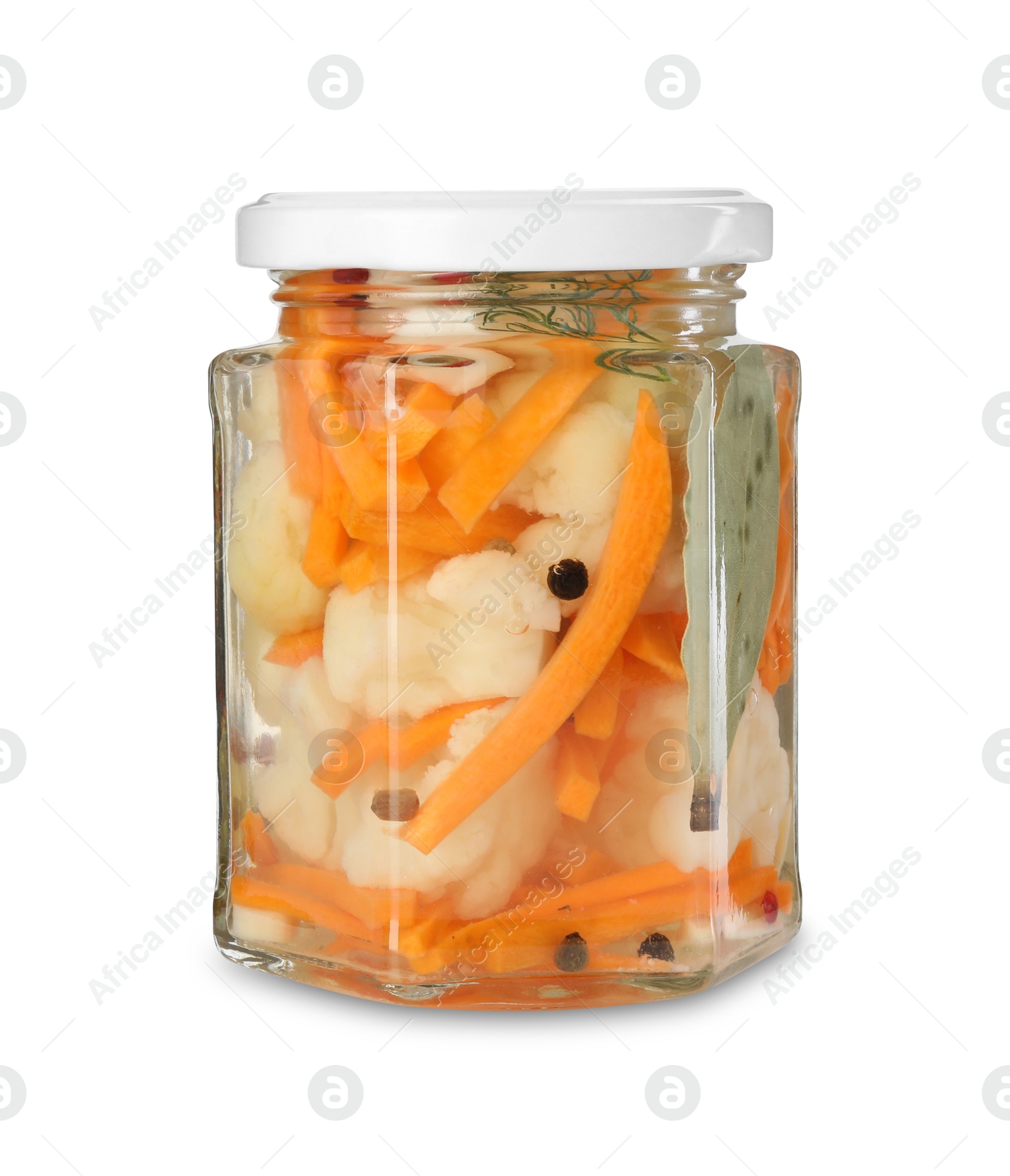 Photo of Tasty pickled carrots and cauliflower in jar isolated on white