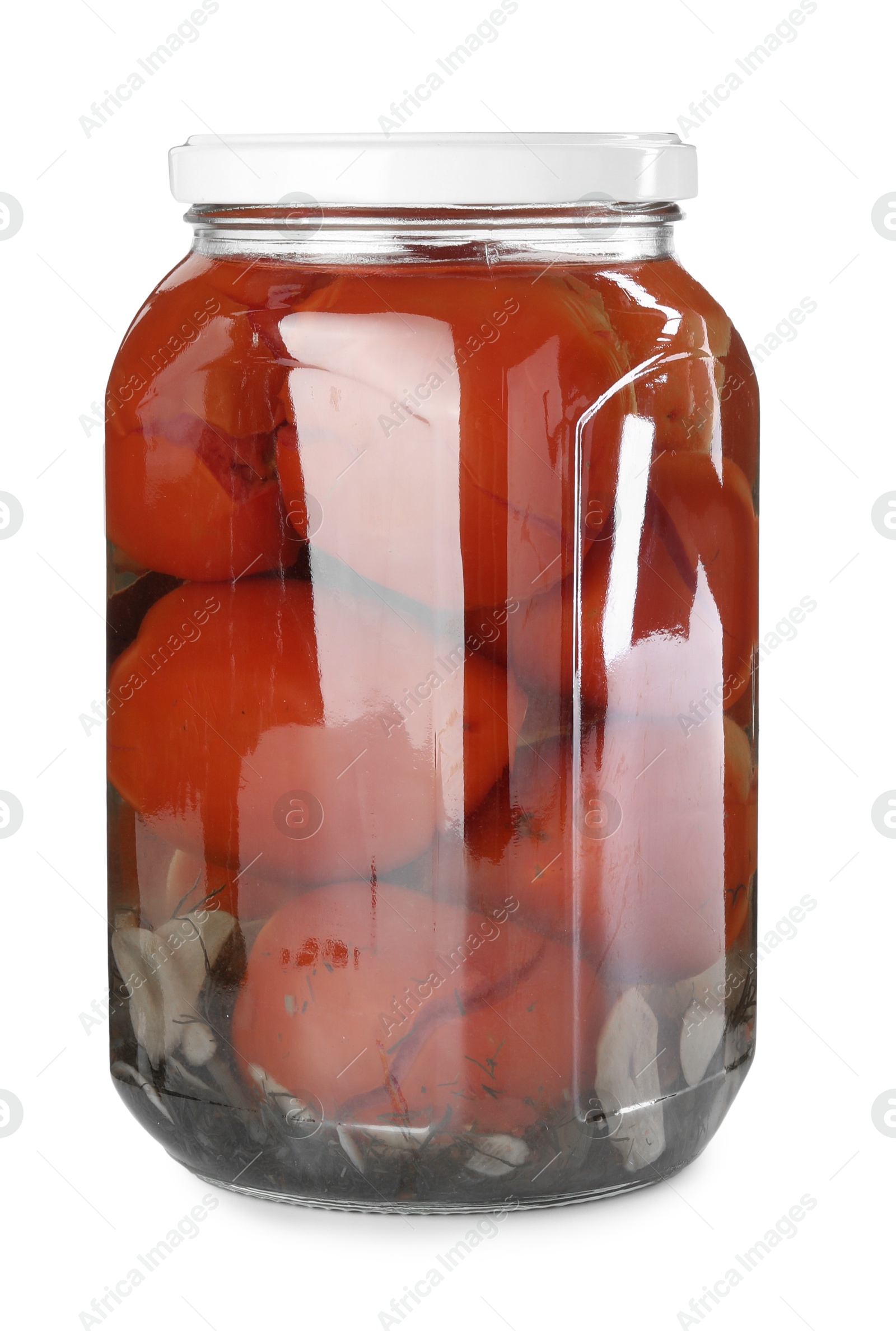 Photo of Tasty pickled tomatoes in jar isolated on white