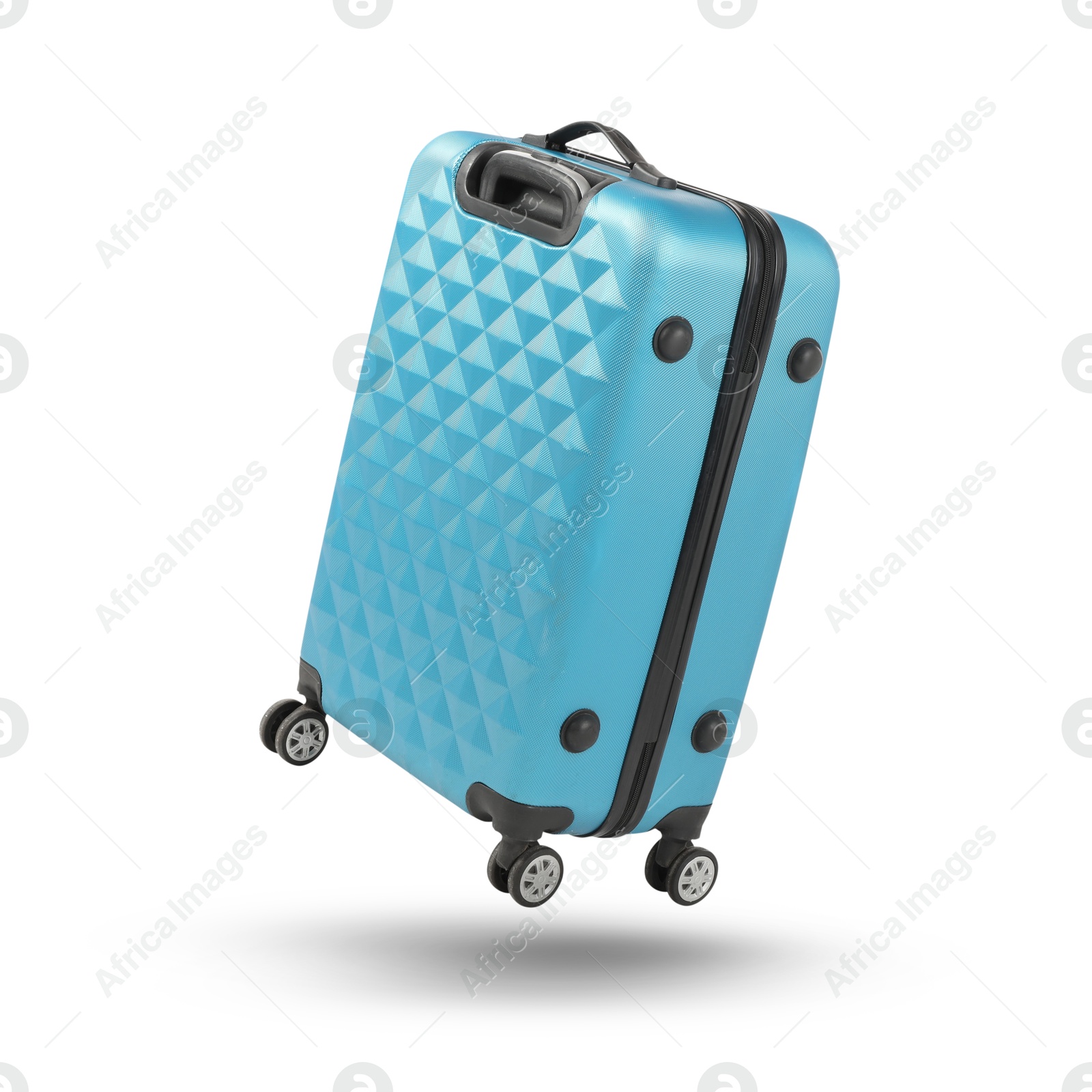 Image of Light blue suitcase in air on white background