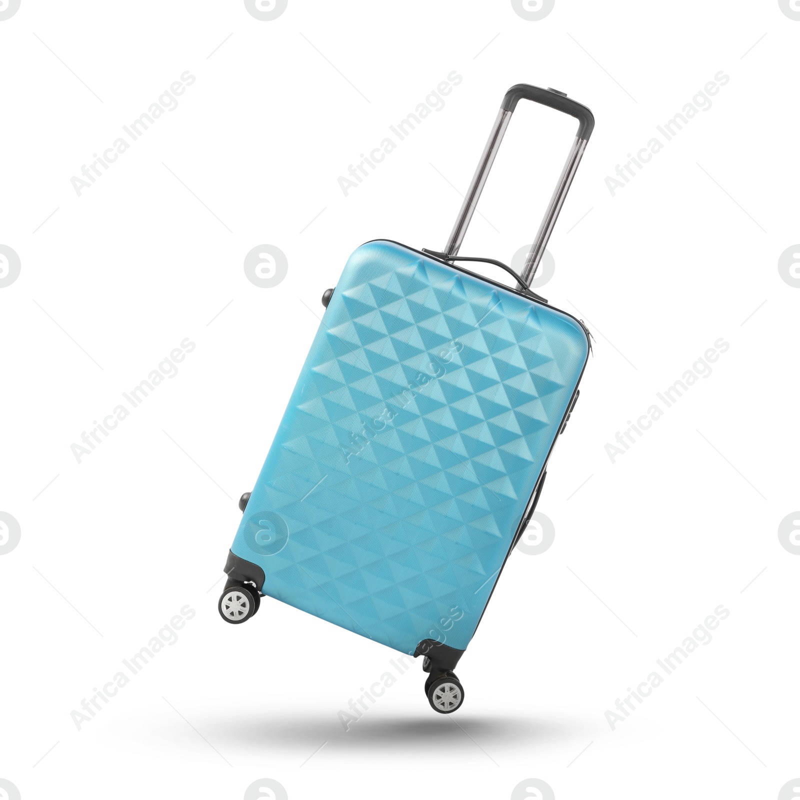 Image of Light blue suitcase in air on white background