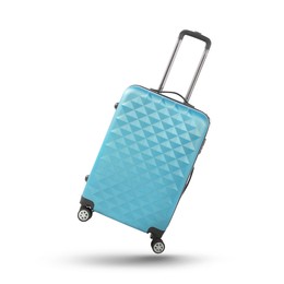 Light blue suitcase in air on white background