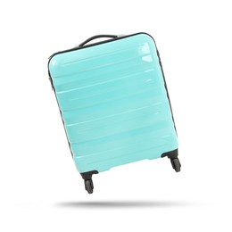 Turquoise suitcase in air on white background